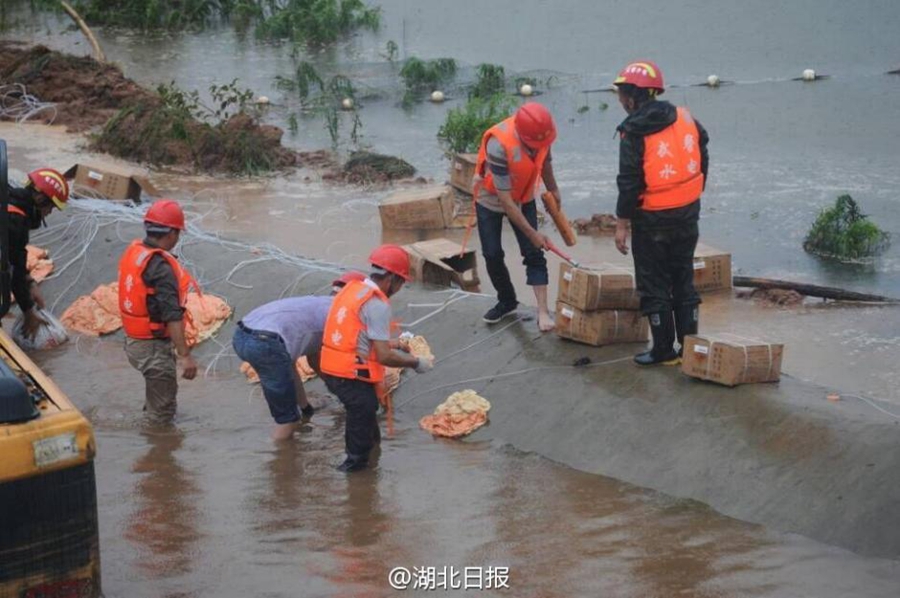 Dam's floodway blasted to discharge water in Hubei province
