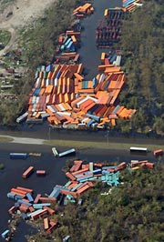 Cargo containers lay where they were tossed by Hurricane Katrina in New Orleans August 31, 2005.