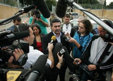 Israel's newly elected Labor Party leader Amir Peretz speaks to the media after a meeting with Israeli Prime Minister Ariel Sharon in Tel Aviv, Israel, Thursday Nov. 17, 2005.