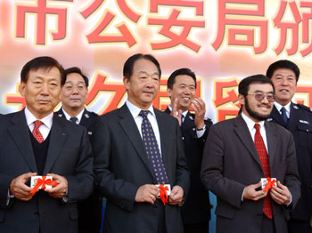 Procedures for granting permanent-resident status to foreigners akin to the "green card" in the United States may be revised, a senior official said yesterday.