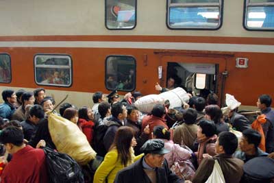 They migrate to big cities to earn a living all year round, so the holiday trip for most migrant workers for a family reunion in the upcoming Lunar New Year is sweet and full of hope despite a lot of difficulties in getting a ticket.