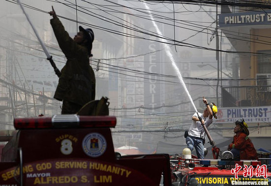 菲律賓首都購物中心發生火災 起火原因尚未確定