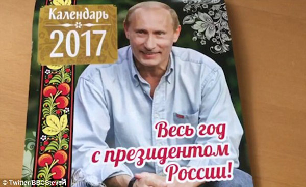 普京2017新日歷亮相:抱小貓孩子大秀溫情(組圖)