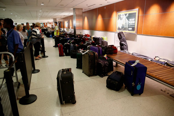 乘機出行Q&A:如何能更快取到行李?降落時為何打開遮光板?